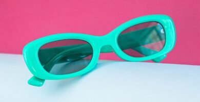 a pair of sunglasses sitting on top of a table